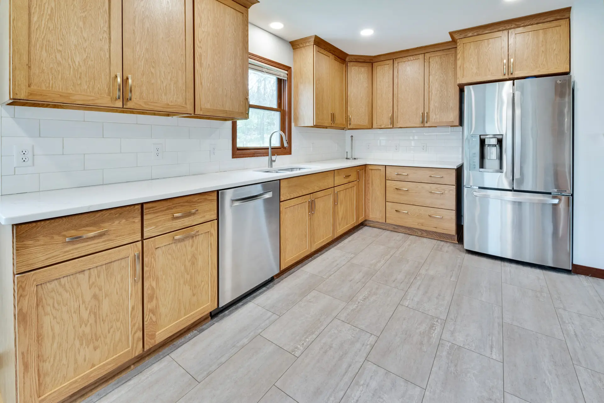 Kitchen view of many cabinets and counter space